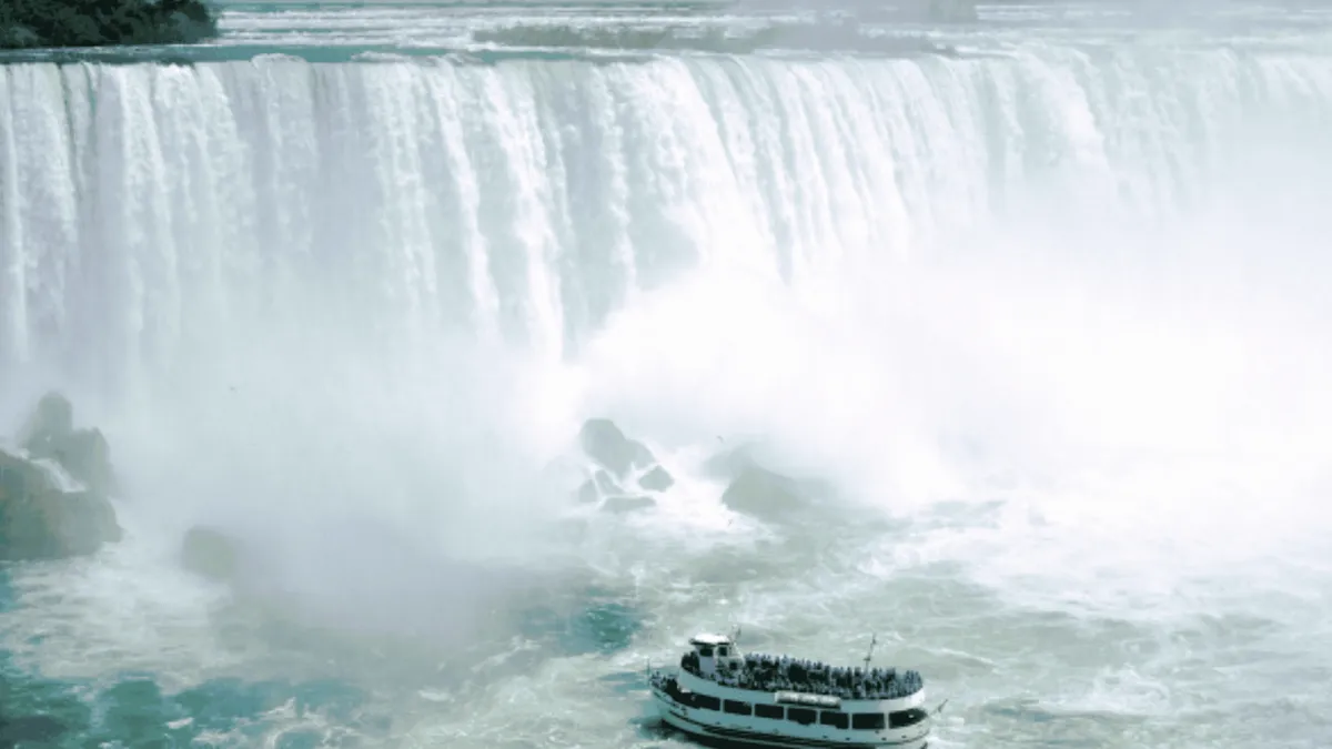 Overnight bus, Tesla statue on a Niagara Falls tour from NYC, New York